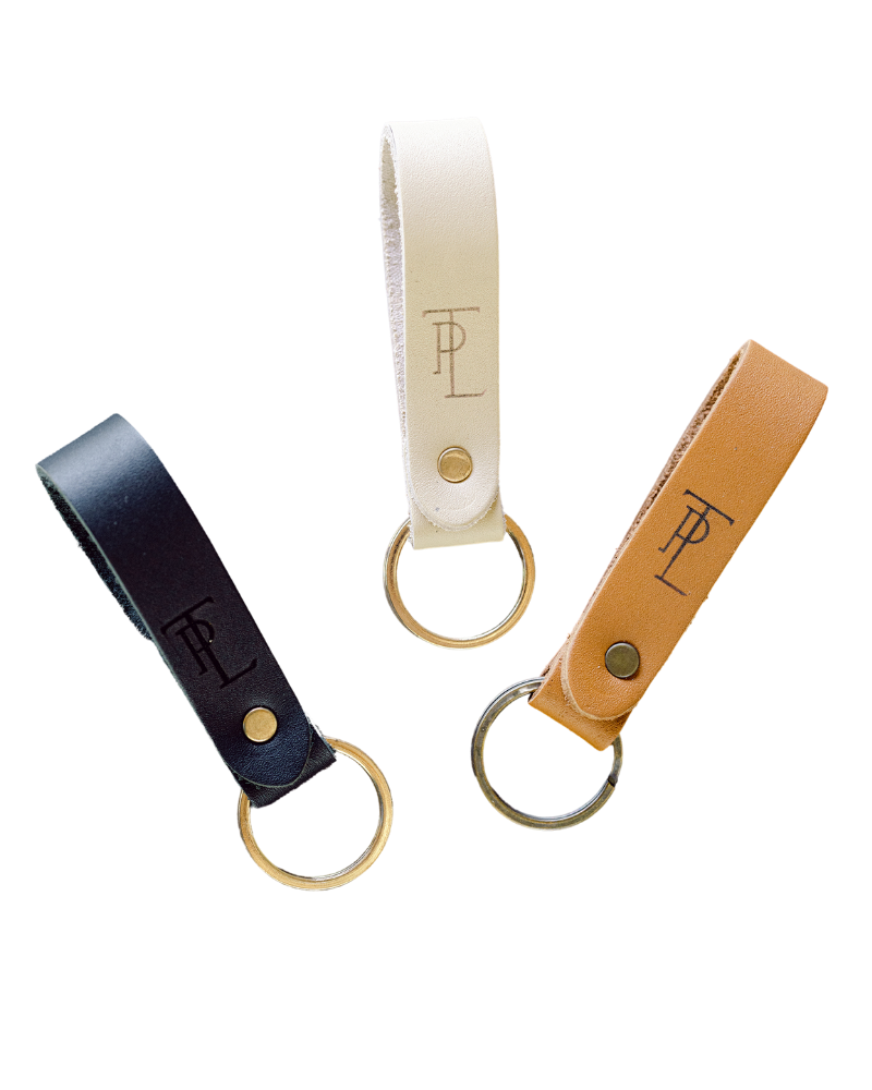 Leather keychain with TPL monogram from Those Plant Ladies. Comes in three colors: black, ivory, and cognac.