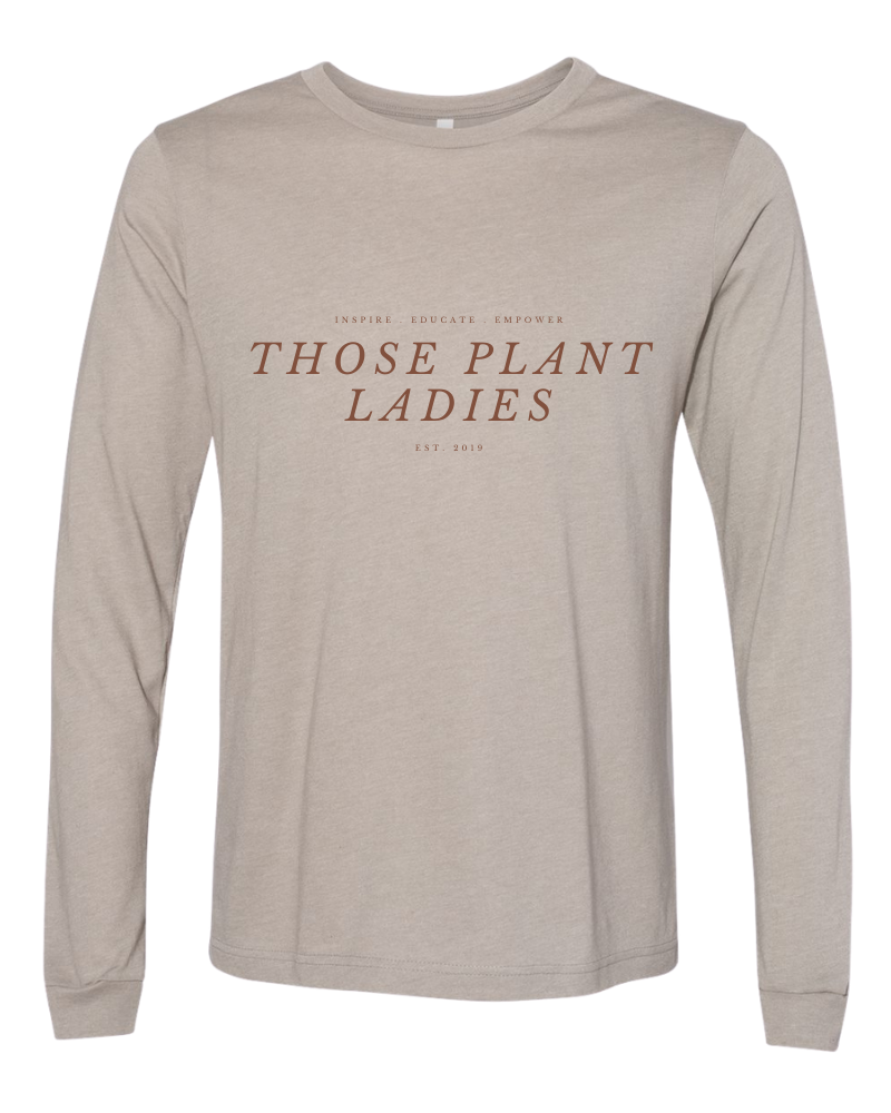 Long sleeved tshirt from Those Plant Ladies. Neutral tee with cognac letters that read: inspire, educate, empower Those Plant Ladies.