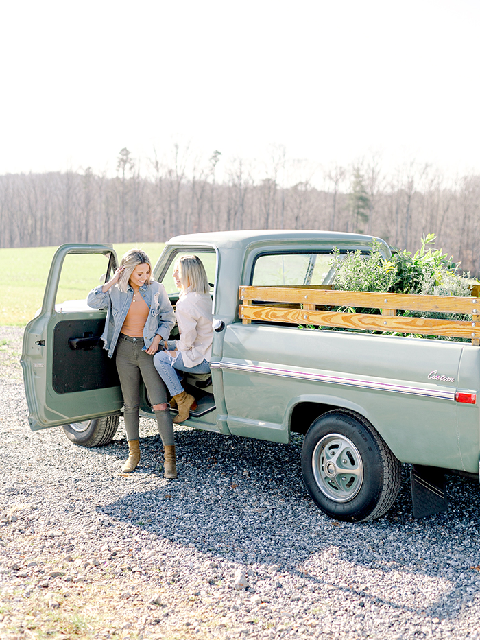 Fawn and Heather of Those Plant Ladies with an antique Ford truck at their brand story photo and video shoot.