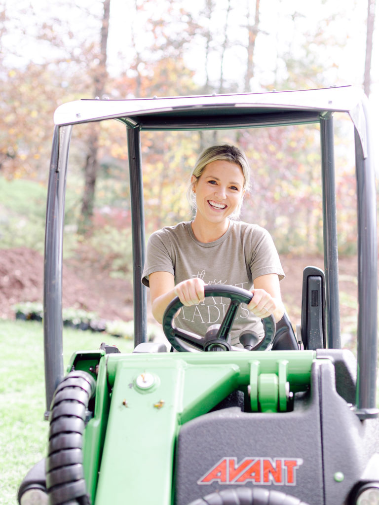 Fawn, CEO of Those Plant Ladies, driving the Avant Loader 630.