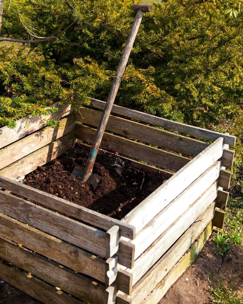 A wooden compost bin.