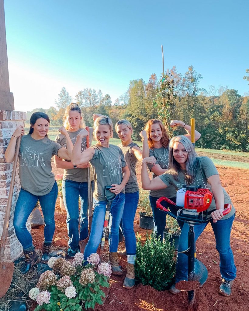 Fawn of Those Plant Ladies and other women posing with plants and other landscape tools.