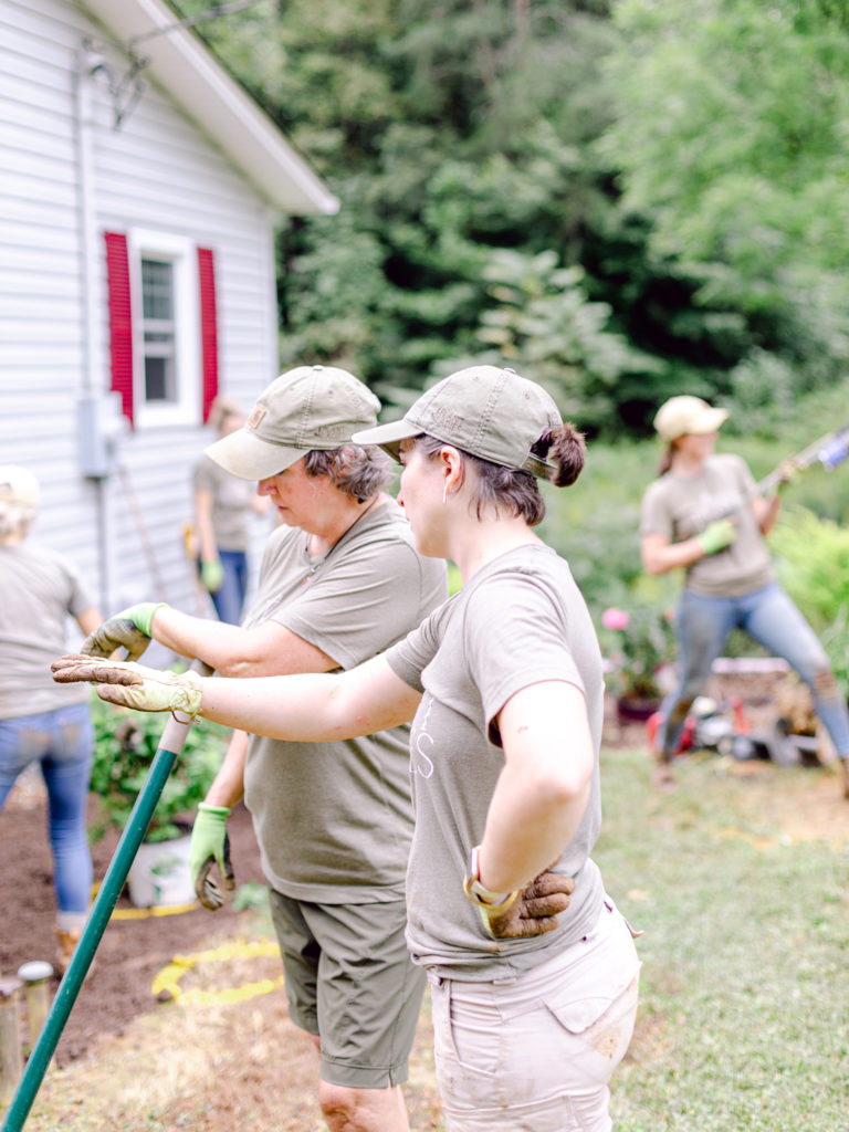 Alexa of Those Plant Ladies instructing the crew at a landscape installation in North Carolina.
