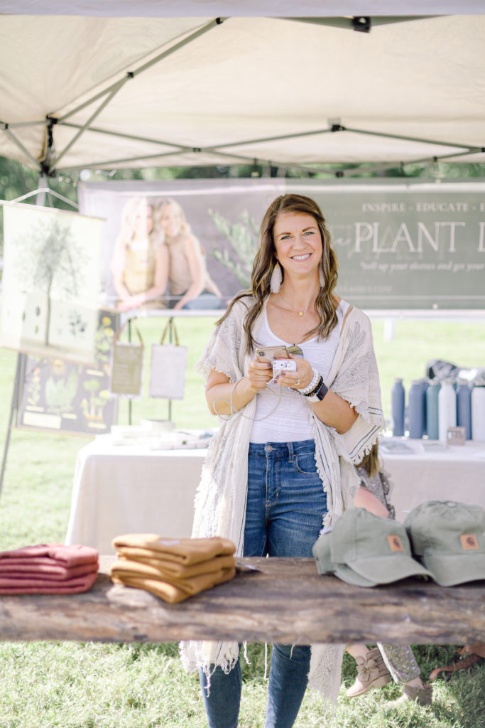 Claire of Those Plant Ladies sharing to social media at an event.