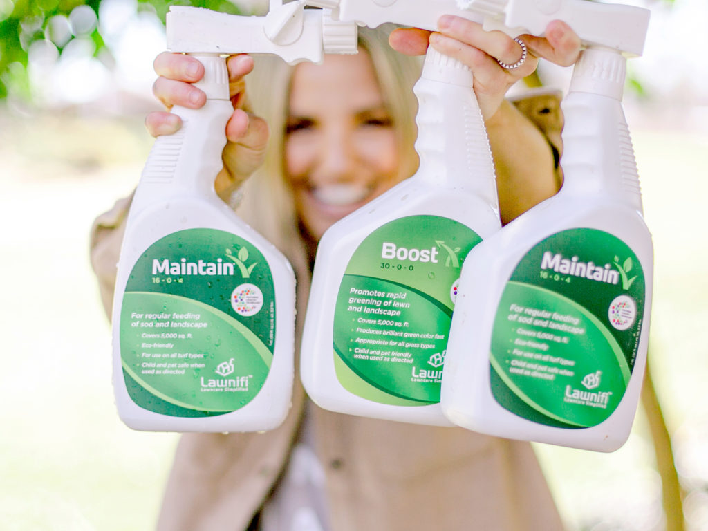 Fawn Wilson of Those Plant Ladies with the Lawnifi bottles from the subscription service.